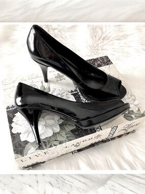 NINE WEST “Tristano” Peep Toe Platform Pumps